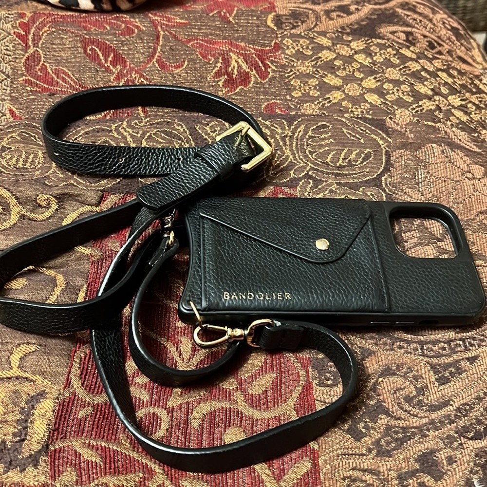 Bandolier iPhone 13 Pro Max leather phone case.